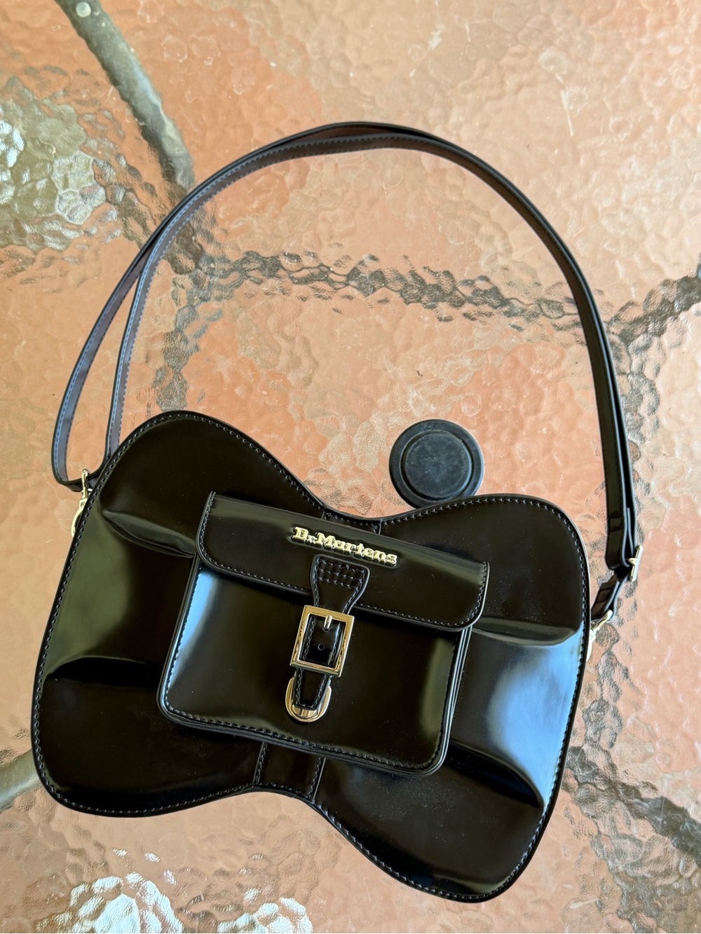 Dr. Martens Black Patent Bow-Shape Shoulder Bag with Gold Hardware